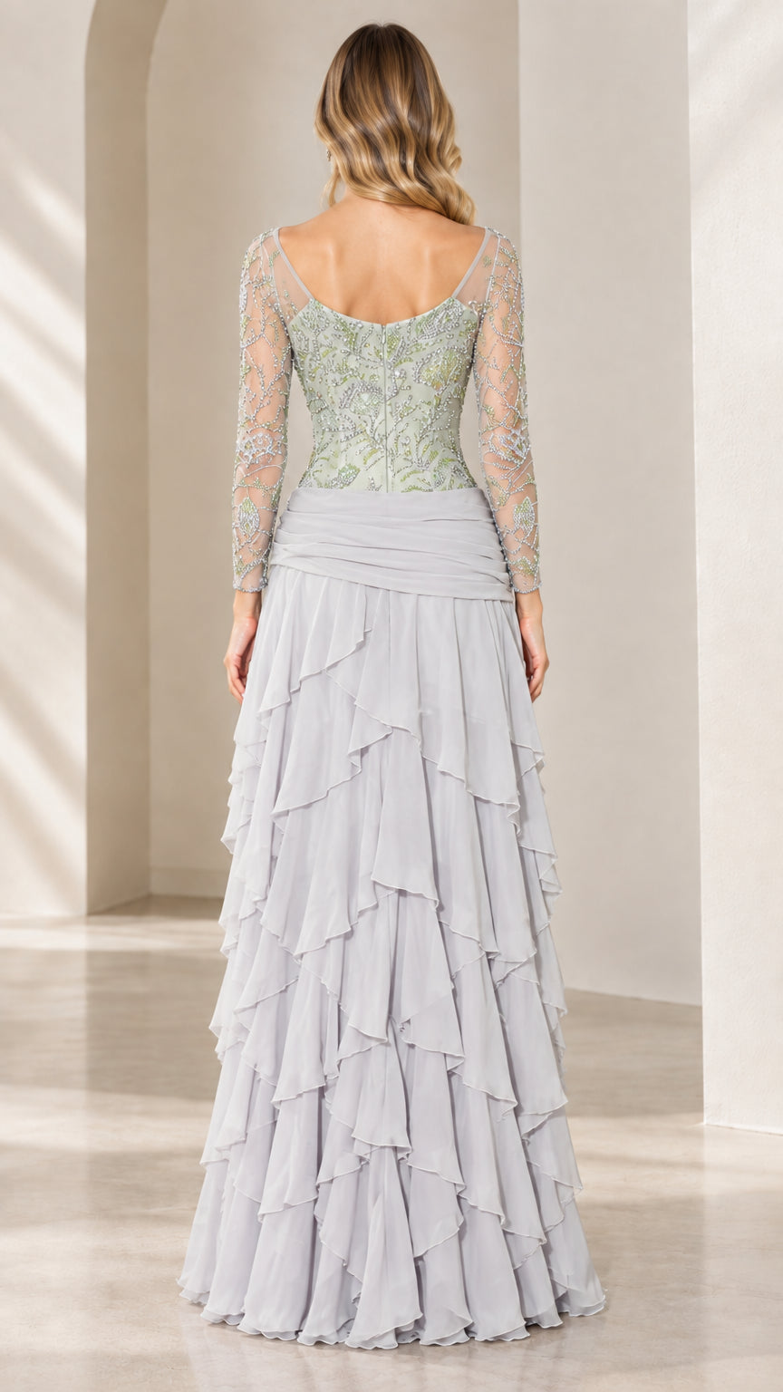 Back view of Sage Green evening gown with illusion neckline and tiered skirt