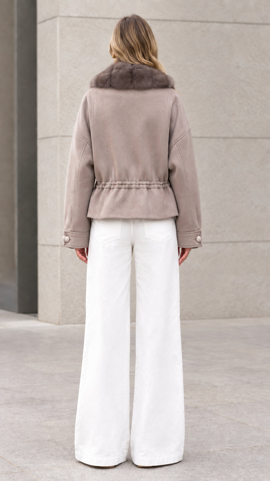 Back view of taupe drawstring waist short coat showing cinched back detail