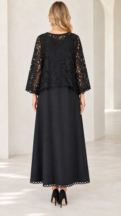 Back view of model in Black floral lace overlay A-line maxi gown