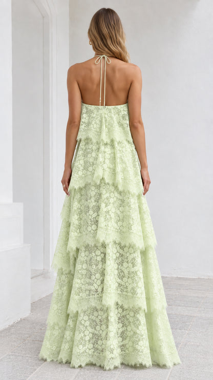 Back view of Mint Green lace halter maxi dress with tie straps and open back
