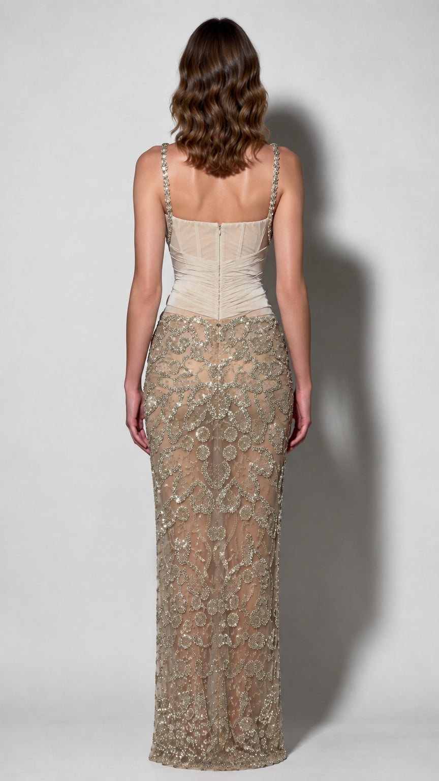 Back view of champagne sheer back corset gown with sequin skirt