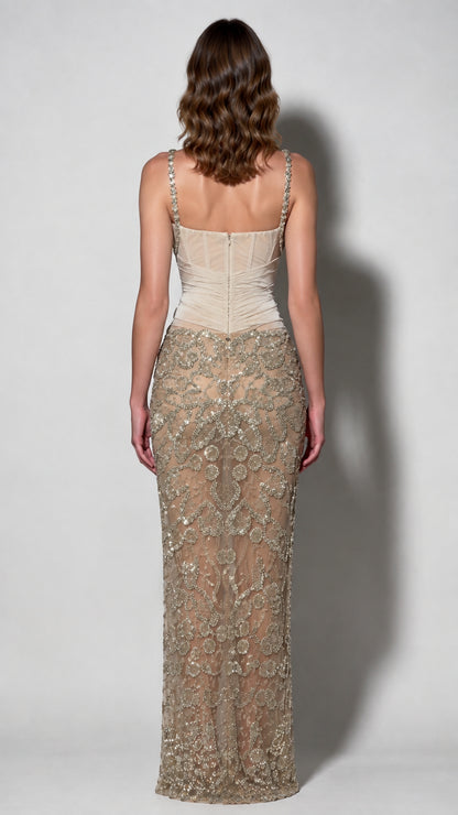 Back view of champagne sheer back corset gown with sequin skirt