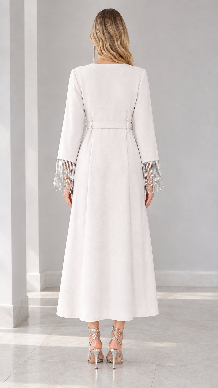 Back view of white long sleeve A-line maxi dress