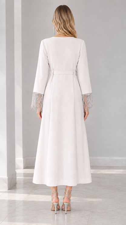 Back view of white long sleeve A-line maxi dress