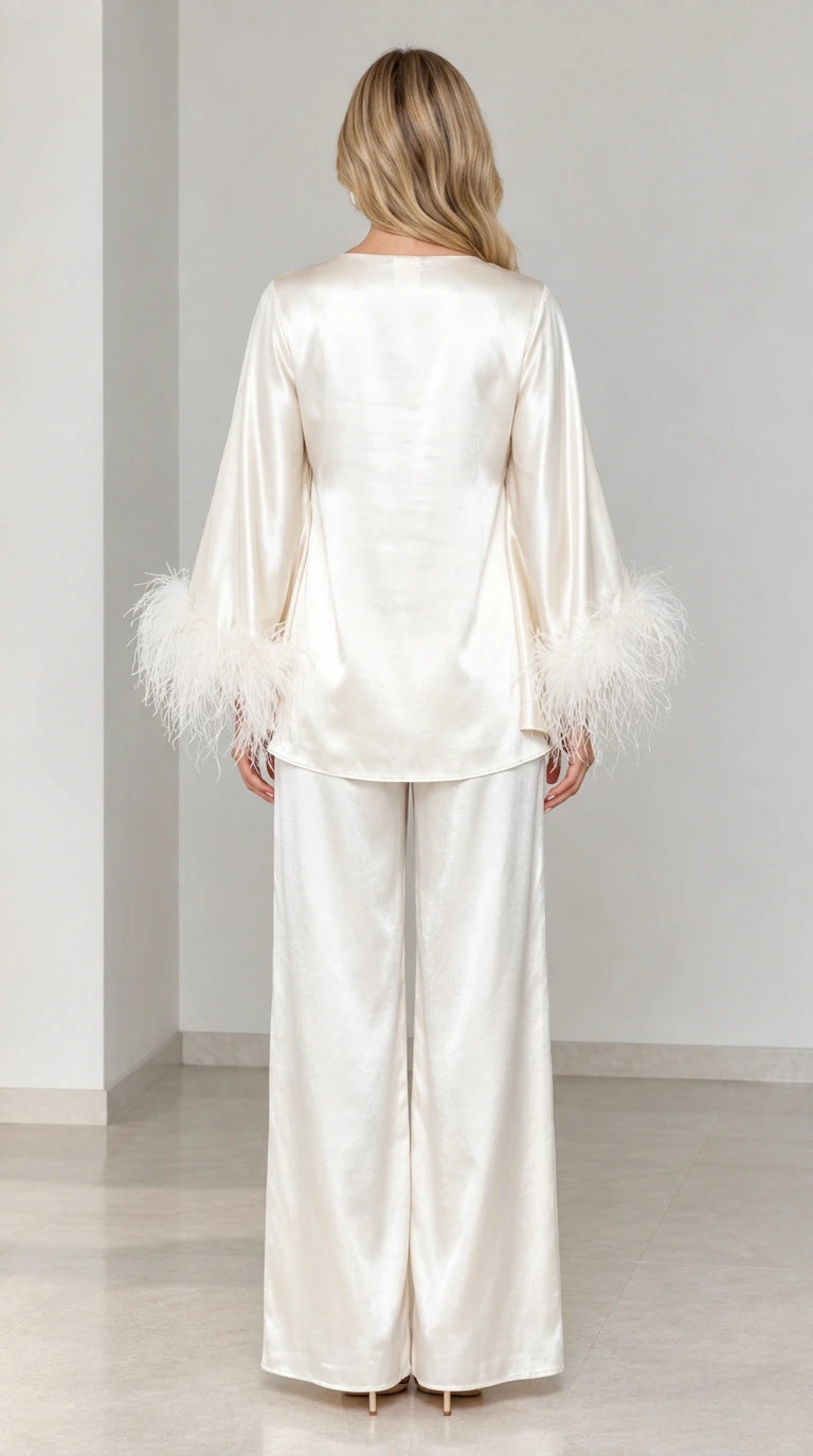 Back view of ivory satin two-piece set with wide-leg trousers