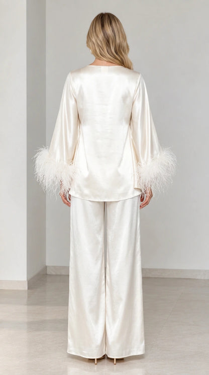 Back view of ivory satin two-piece set with wide-leg trousers