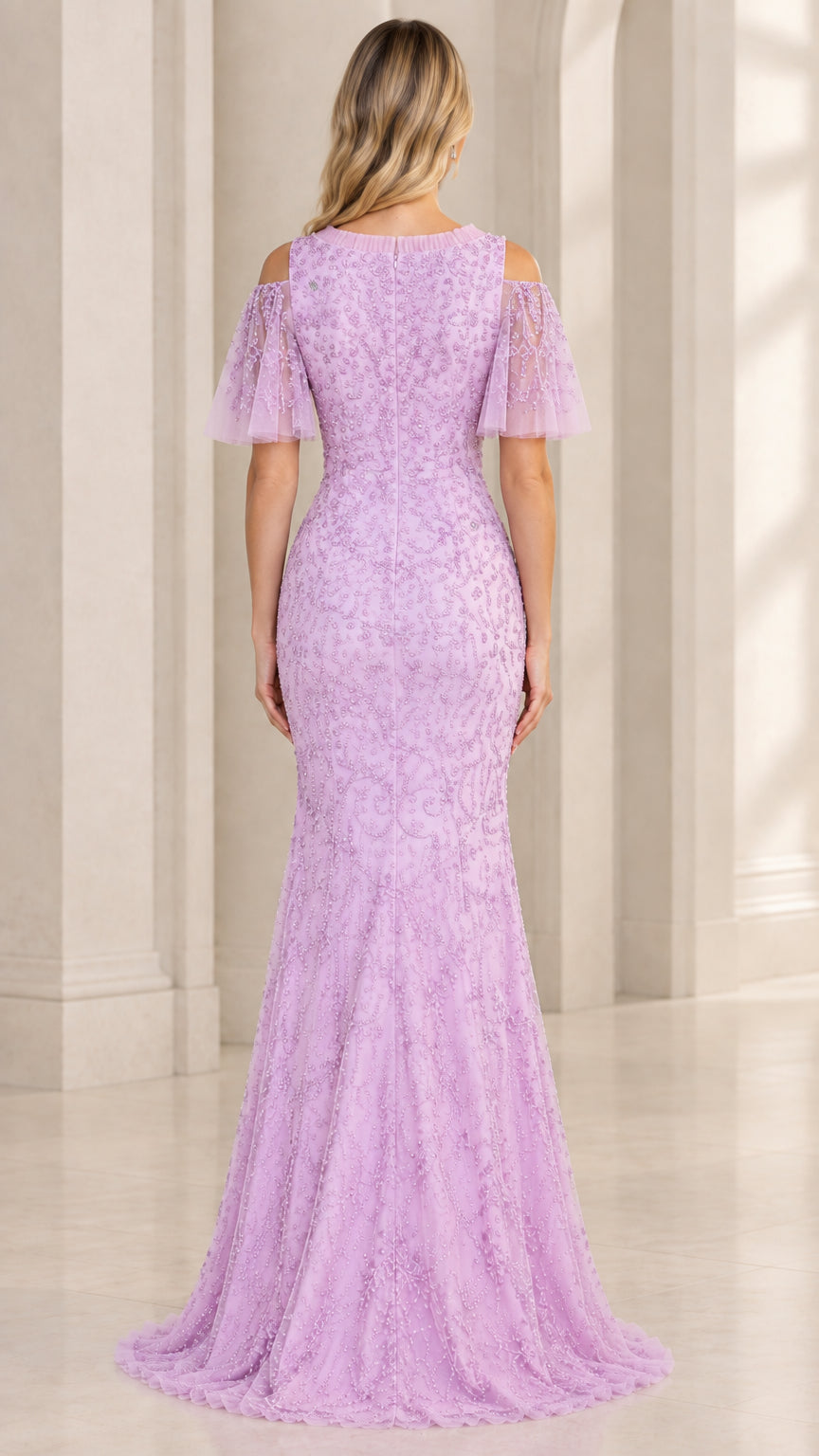 Back view of model in lavender beaded floor-length evening dress