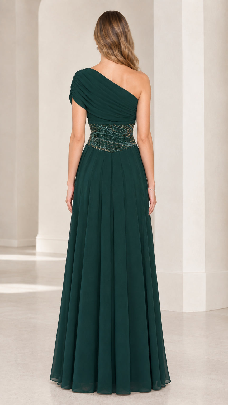 Back view of emerald green one-shoulder floor-length chiffon dress