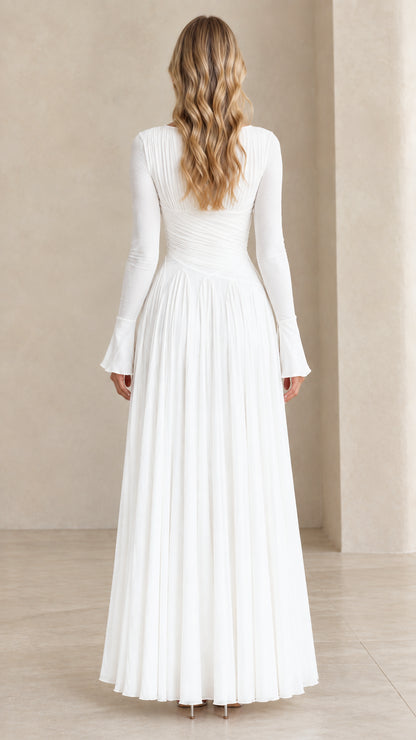 Back view of model wearing white floor-length pleated maxi dress