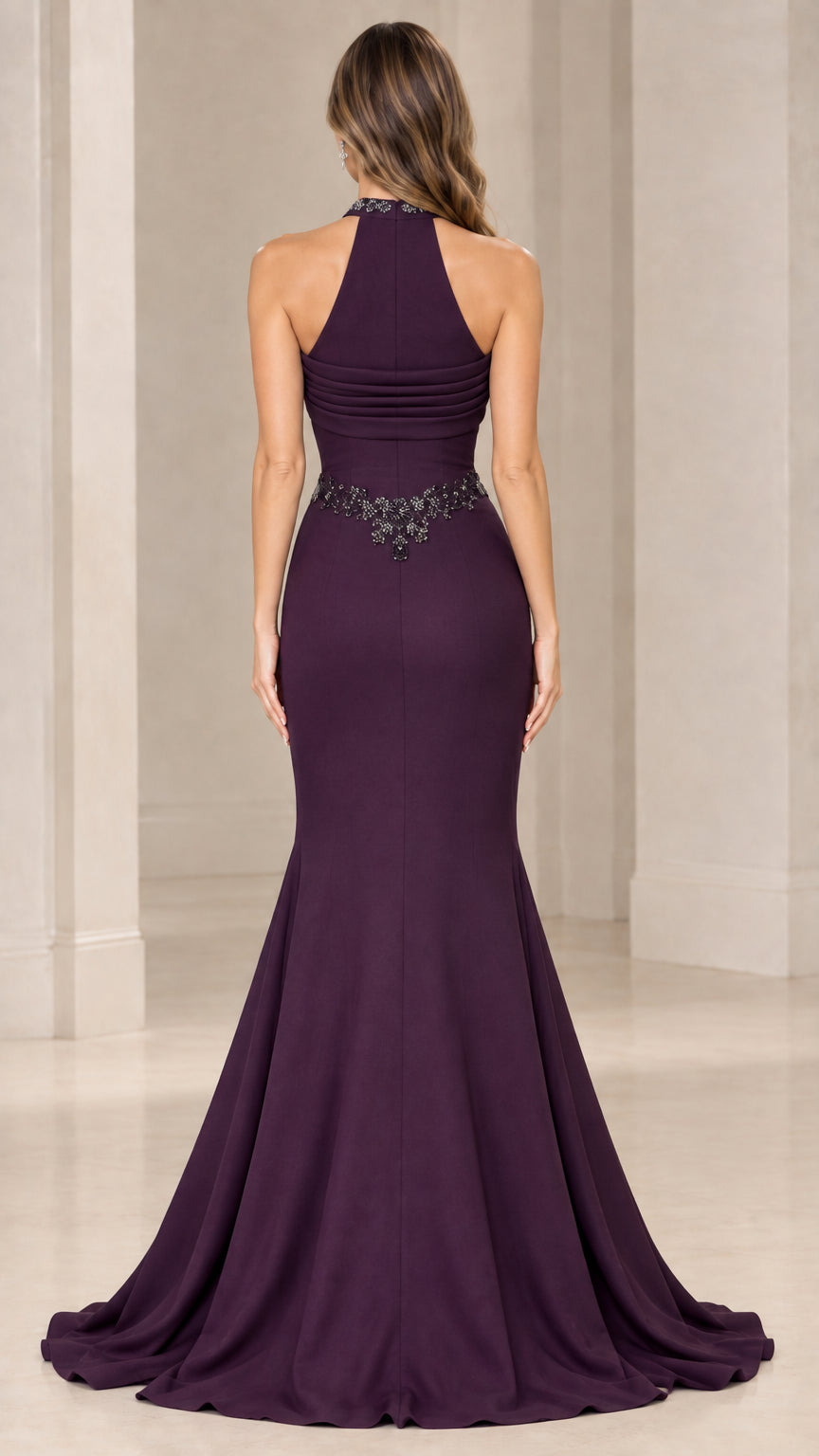 Back view of model in eggplant halter evening gown with high neckline and sweeping train