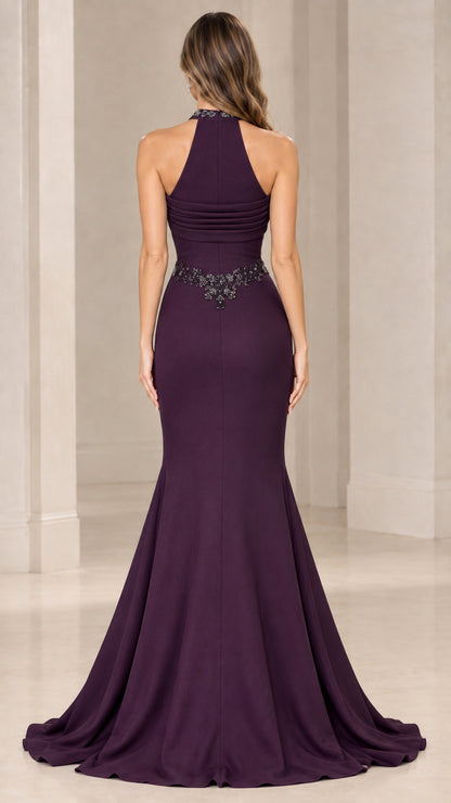 Back view of model in eggplant halter evening gown with high neckline and sweeping train