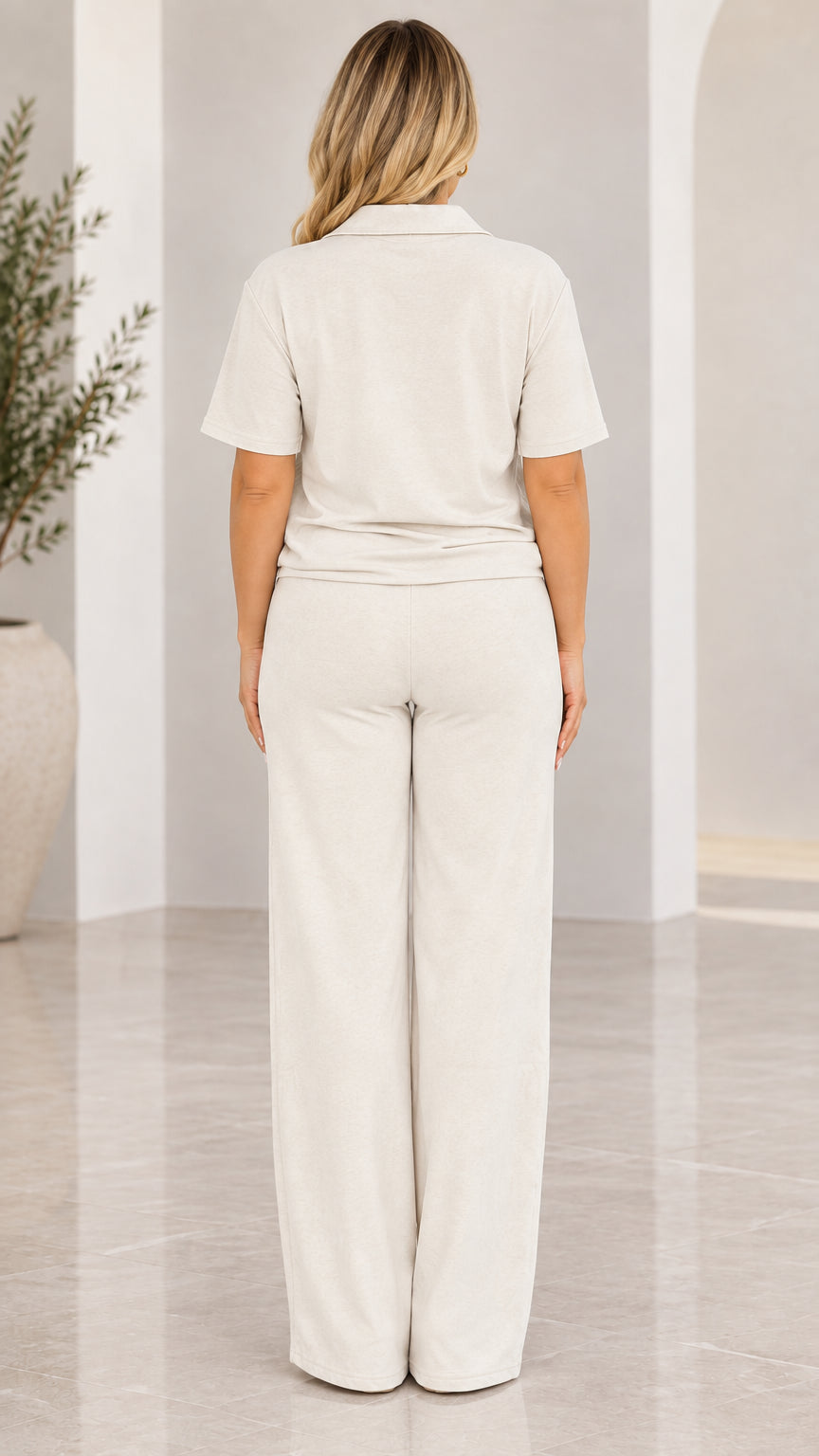 Back view of model wearing Cream short sleeve wide leg lounge set