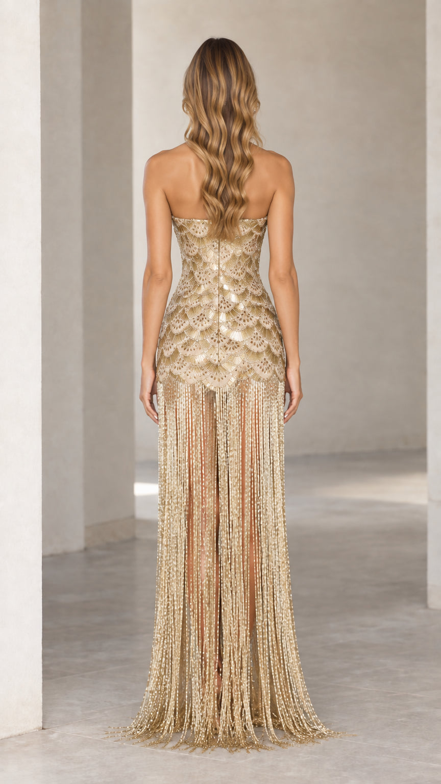 Back view of Champagne Gold strapless sequin fringe formal gown