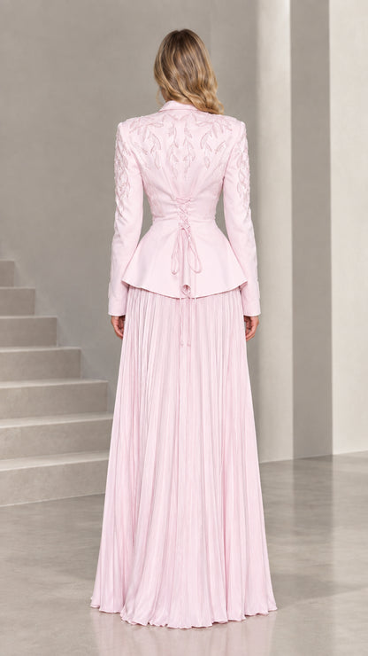 Back view of blush pink blazer showing adjustable corset lace-up waist detail