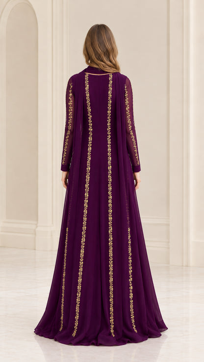 Back view of woman wearing purple long sleeve embroidered maxi dress