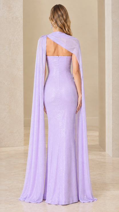 Back view of lavender evening dress showing asymmetrical cape draping