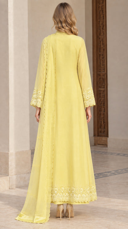 Back view of woman wearing long yellow A-line tunic and matching dupatta scarf