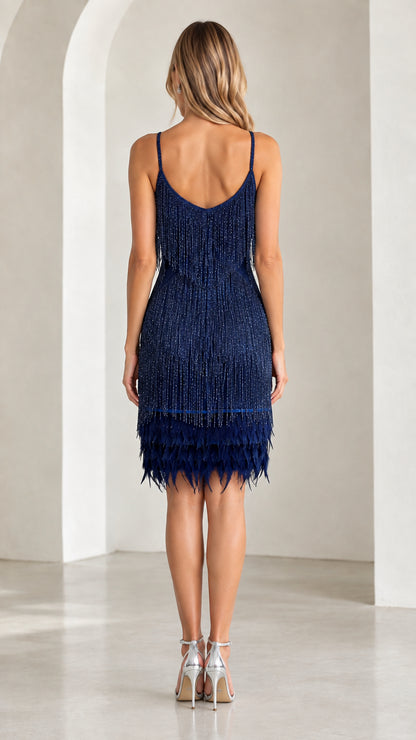 Back view of navy blue spaghetti strap fringe cocktail dress