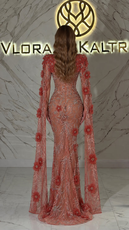 Back view of Dusty Rose long evening dress with dramatic floor-length floral cape sleeves