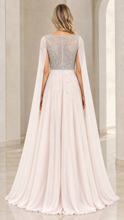 Back view of Champagne beaded bodice and flowing cape gown