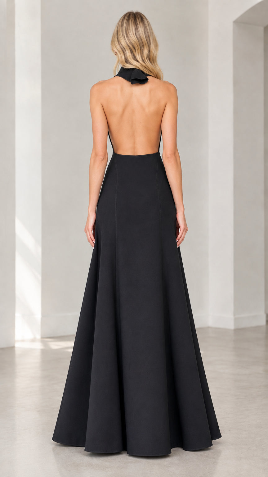 Back view of black halter gown showcasing open back design