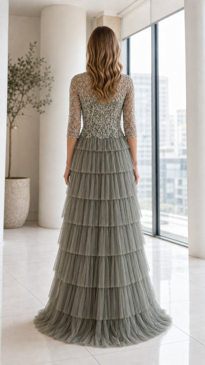 Back view of model wearing Sage Green tiered tulle evening dress