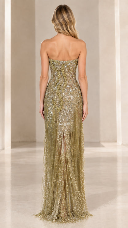Back view of strapless champagne gold floor-length beaded gown