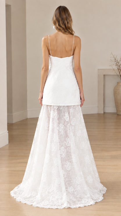 Back view of white spaghetti strap lace formal gown with sweeping train