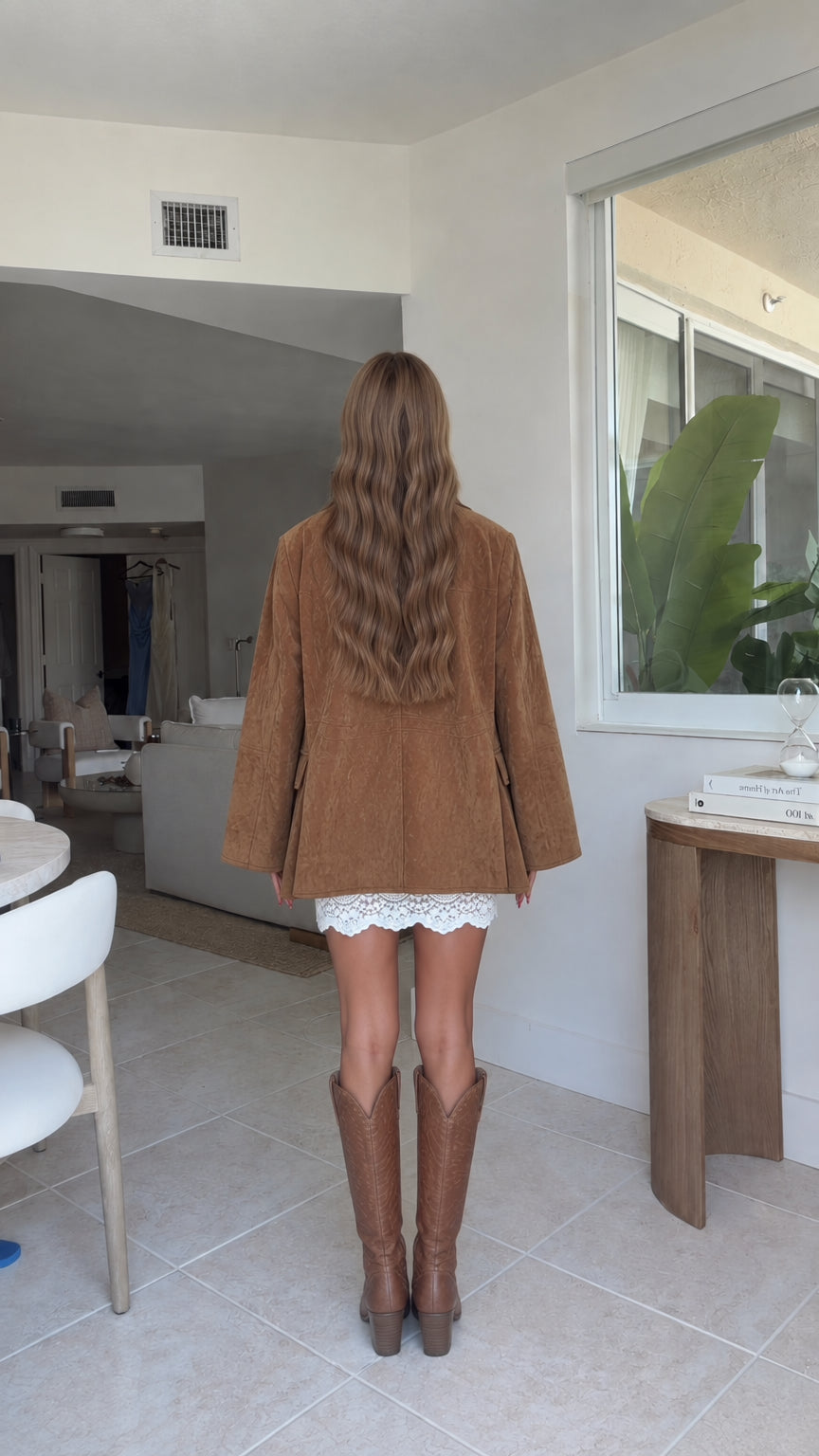 Back view of model wearing camel suede-look oversized blazer