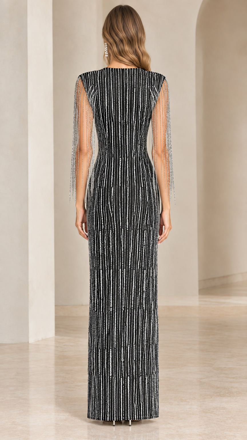 Back view of black linear sequin formal column dress