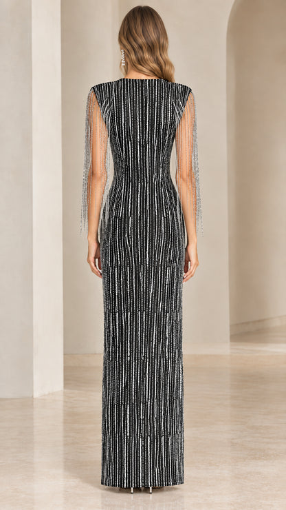 Back view of black linear sequin formal column dress