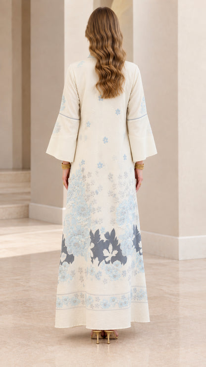 Back view of Cream modest kaftan dress showing elegant floral hem embroidery