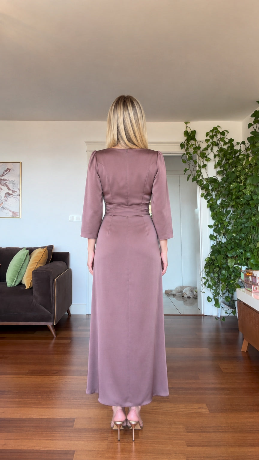 Back view of model wearing dusty mauve satin maxi dress with back zipper