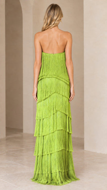 Back full-length view of model wearing the lime green tiered fringe maxi dress