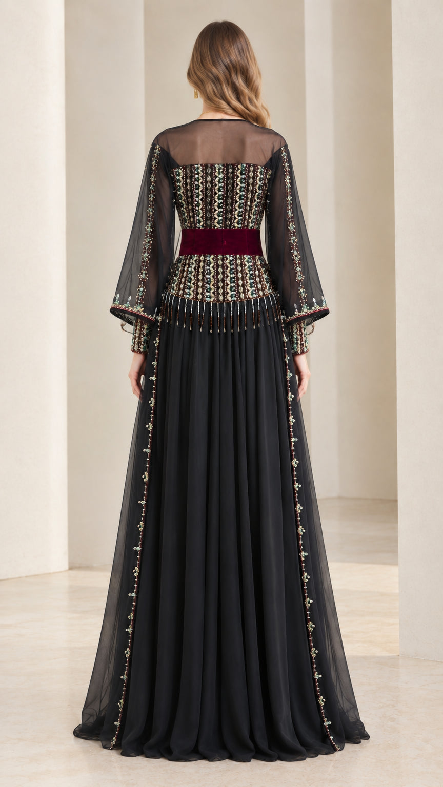 Back view of black floor-length beaded evening dress