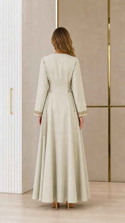 Back view of full-length sage green modest kaftan dress