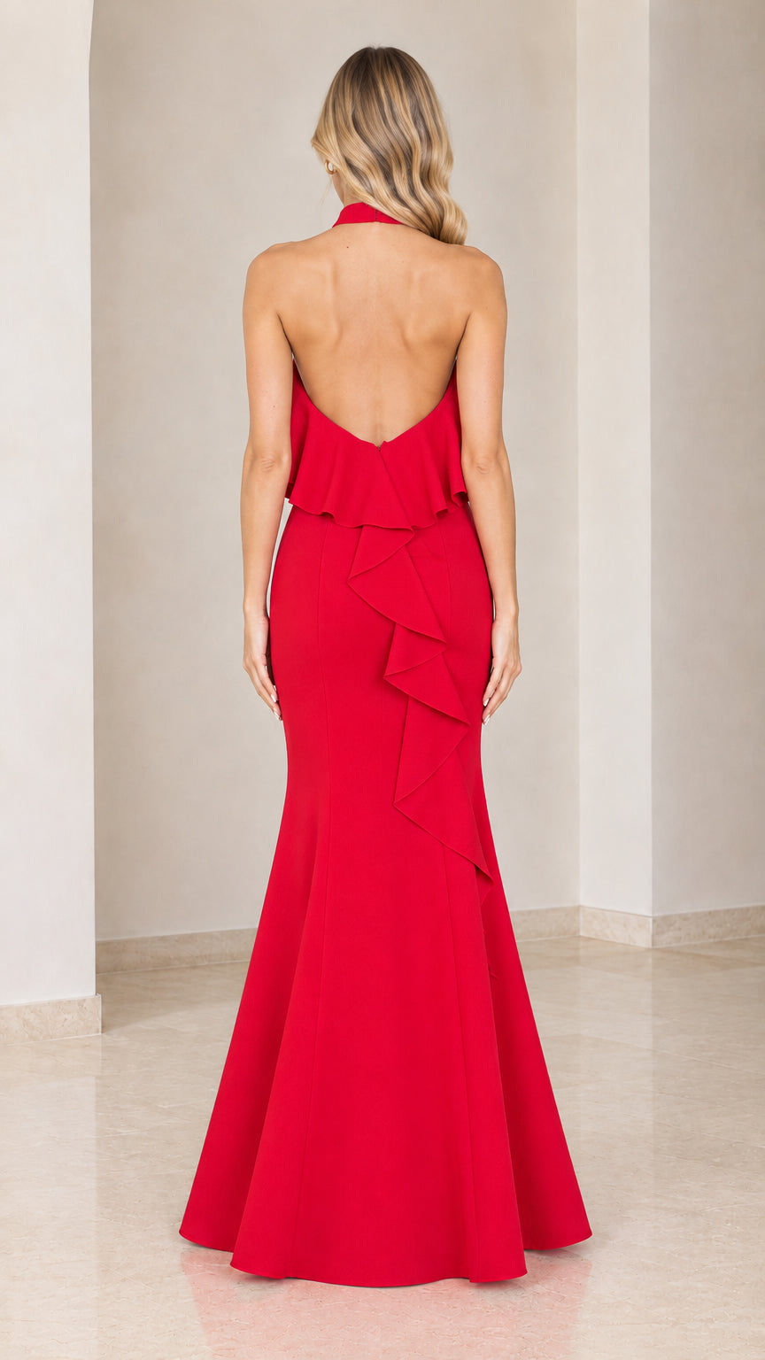Back view of red maxi dress showing open back and cascading ruffle detail