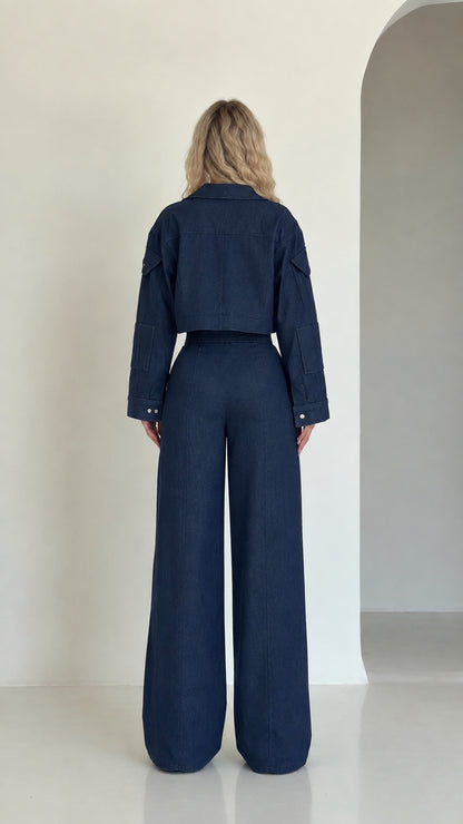Rear full view of navy blue cropped jacket and wide-leg trousers set