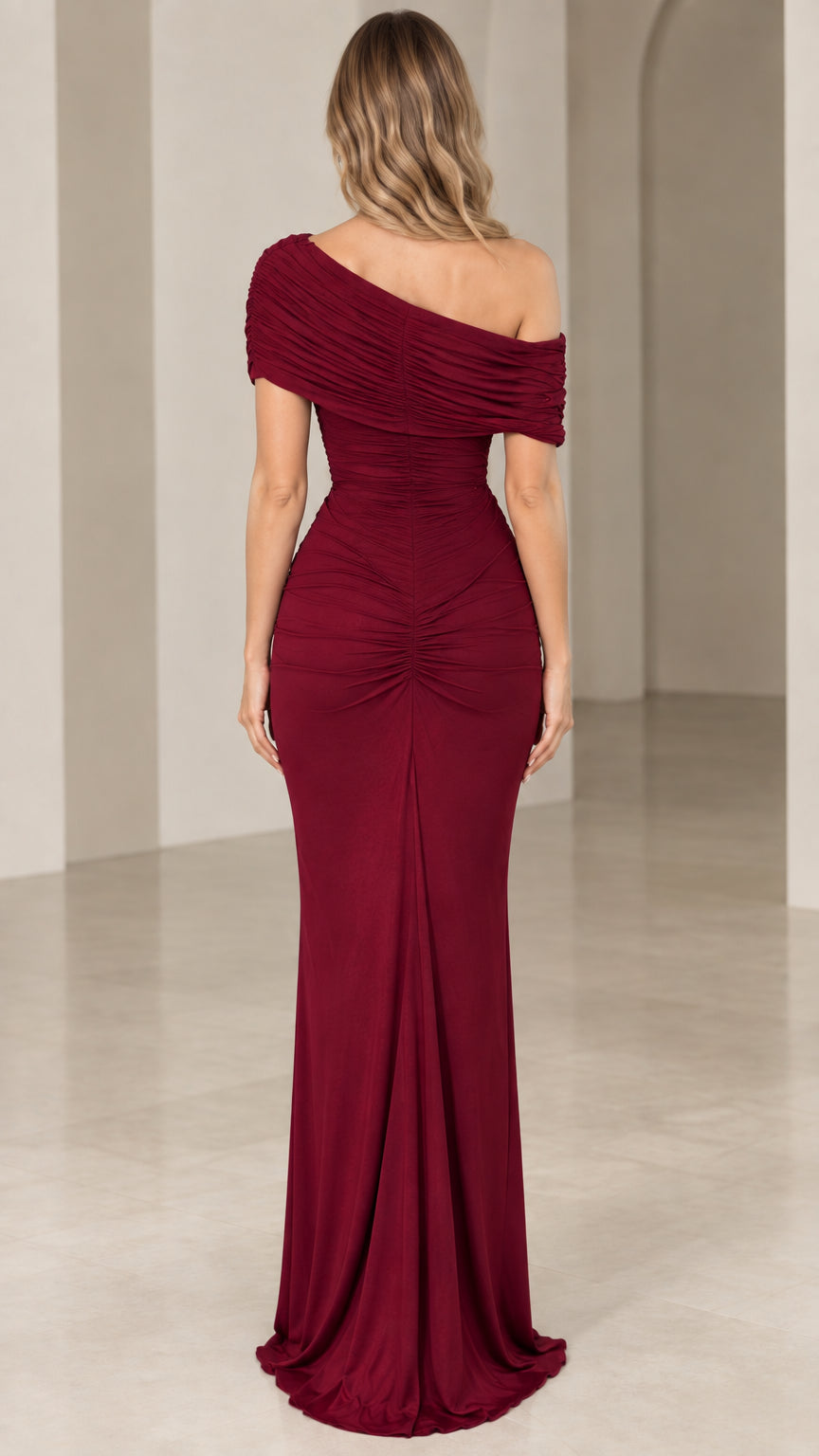 Back view of model wearing burgundy ruched bodycon maxi dress