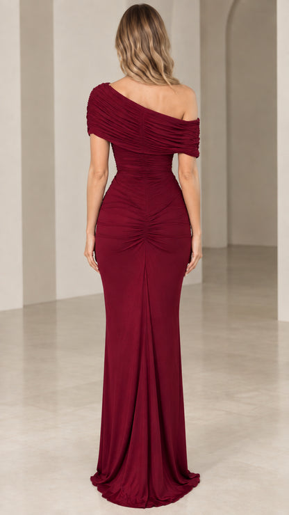 Back view of model wearing burgundy ruched bodycon maxi dress