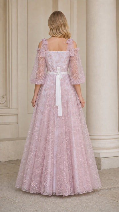 Back view of dusty pink cold shoulder lace formal maxi dress with ribbon tie sash