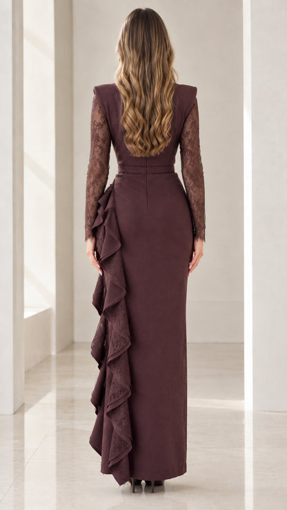 Back view of model wearing Chocolate Brown long sleeve formal gown with lace sleeves