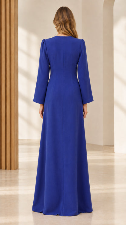 Back view of model wearing royal blue A-line maxi dress