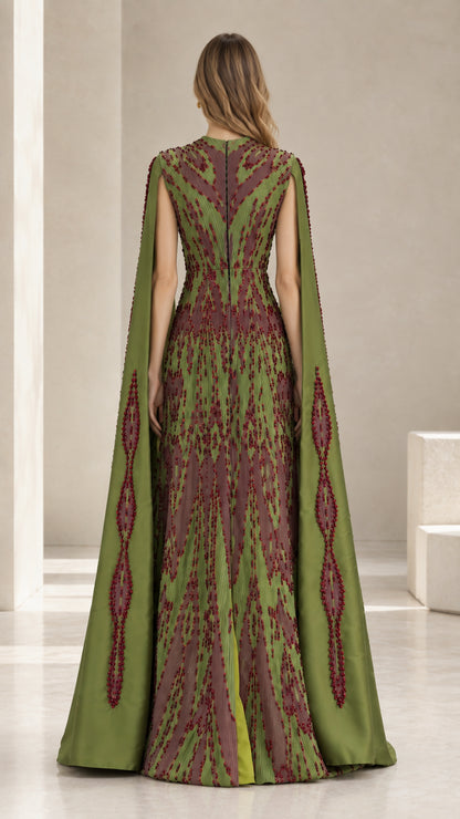 Back view of olive green pleated cape evening dress