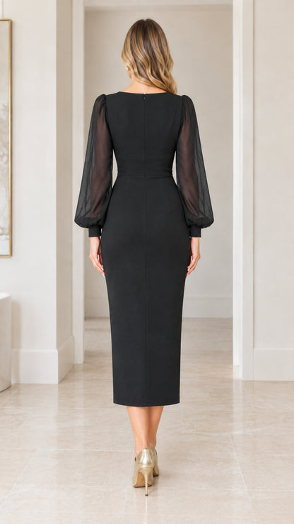 Black sheath midi dress back view highlighting clean seamlines