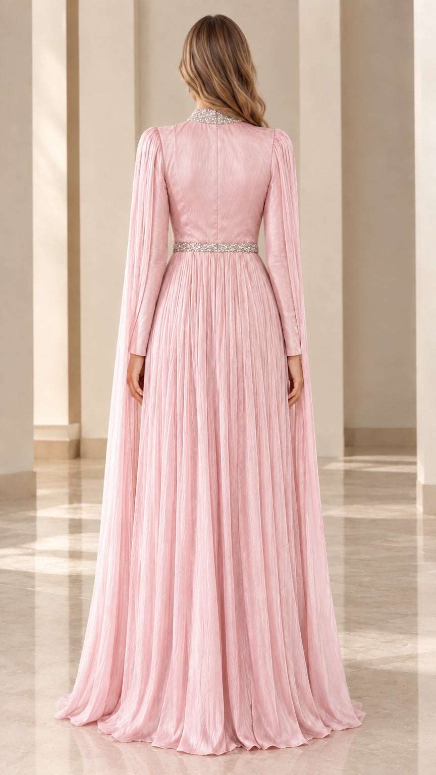 Back view of blush pink floor-length pleated evening dress with draped cape detail