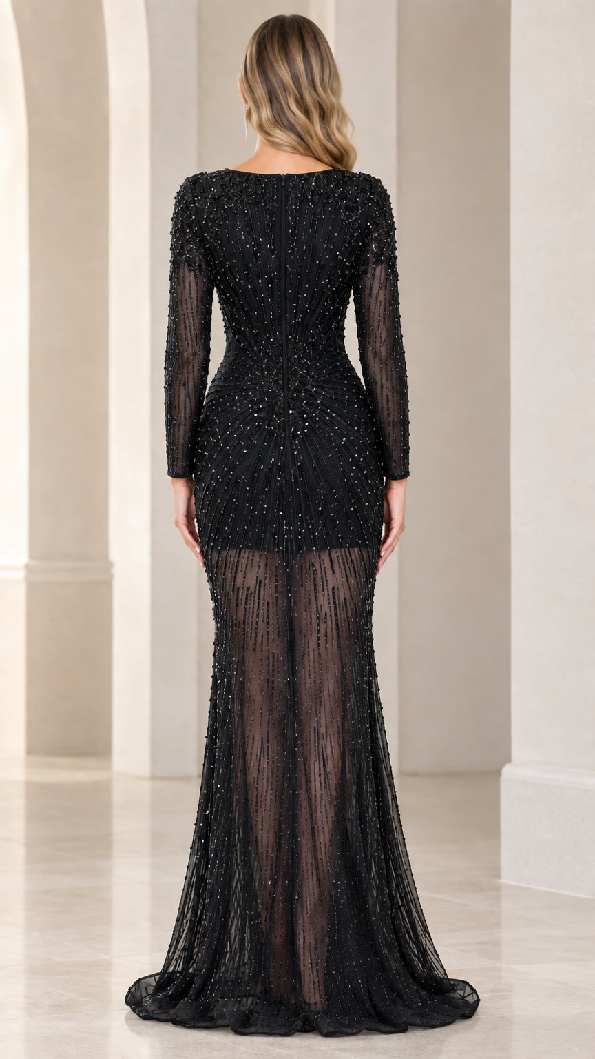 Back view of black sequin formal gown with sheer overlay skirt