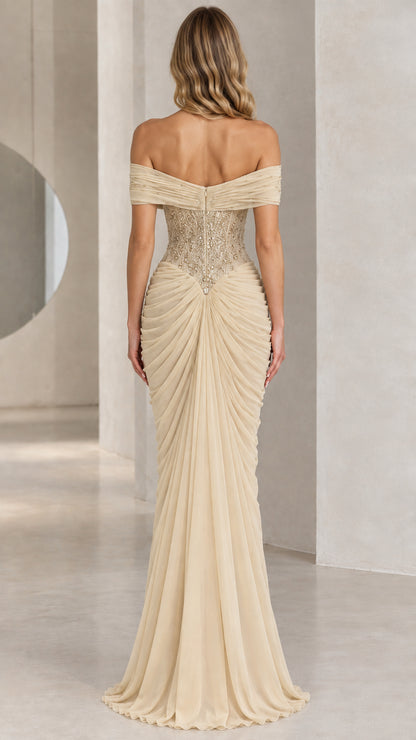 Back view of floor-length champagne formal gown with gathered ruched drape