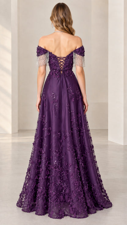 Back view of purple formal gown showing adjustable lace-up corset back and beaded fringe