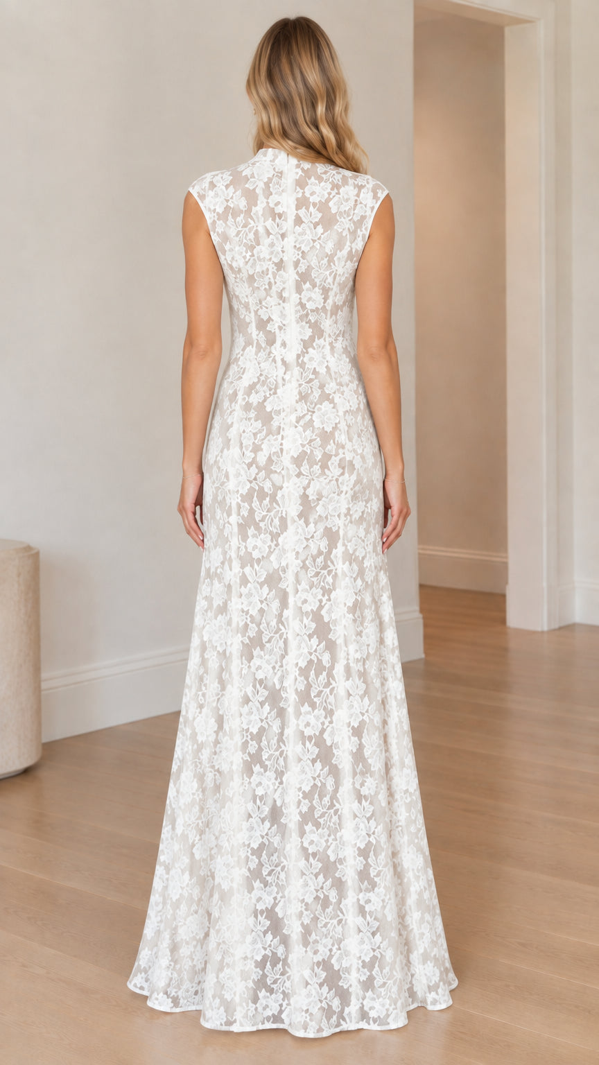Model wearing white floral lace maxi dress back view